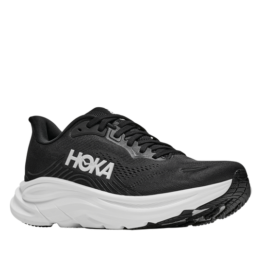 Black running shoe with white sole on a white background