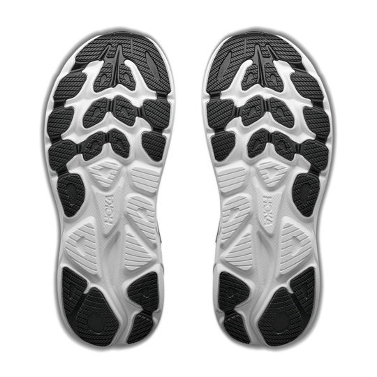 Close-up of the sole of a running shoe with visible brand logo on a white background