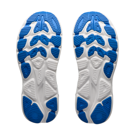 Close-up of blue and white shoe soles on a white background