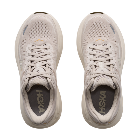 Pair of Hoka running shoes on a white background