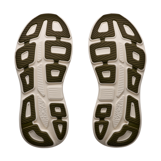Close-up of the sole of a running shoe with brand logo on a white background