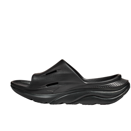 Black slip-on shoe on a white background