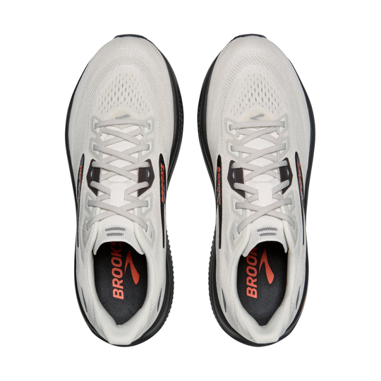 White running shoes with black and red accents on a white background