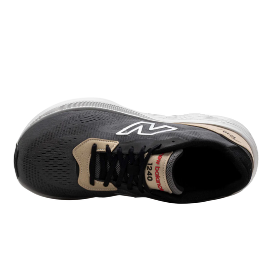 Black athletic shoe with brand logo on a white background