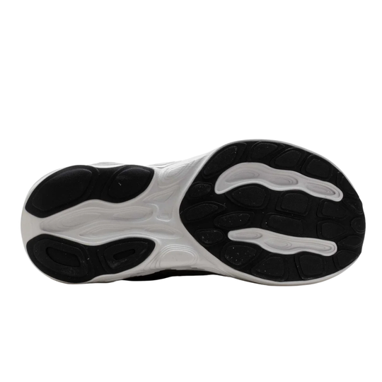 Close-up of a shoe sole with black and white design on a white background