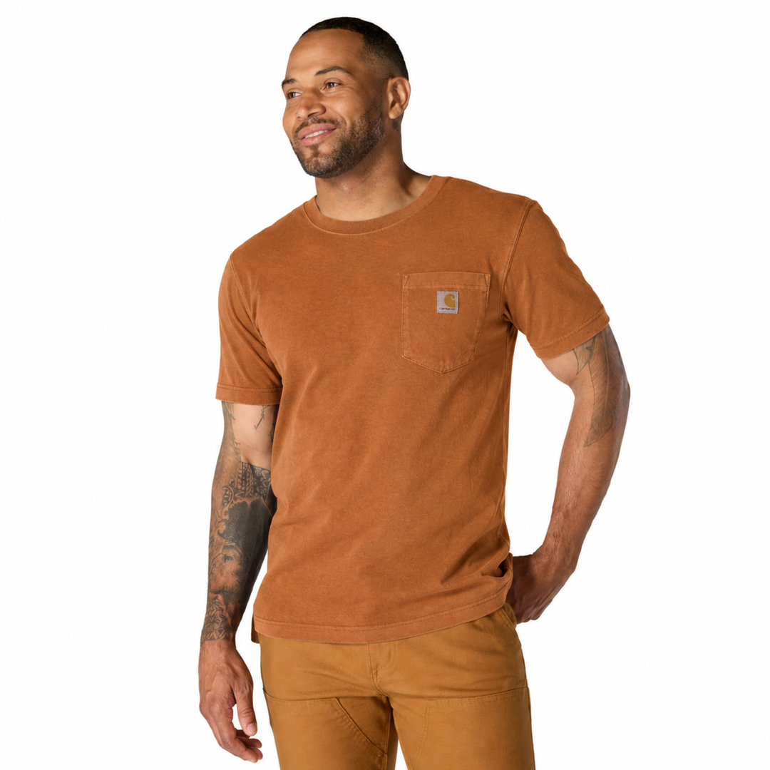 Man wearing a brown t-shirt and pants on a white background