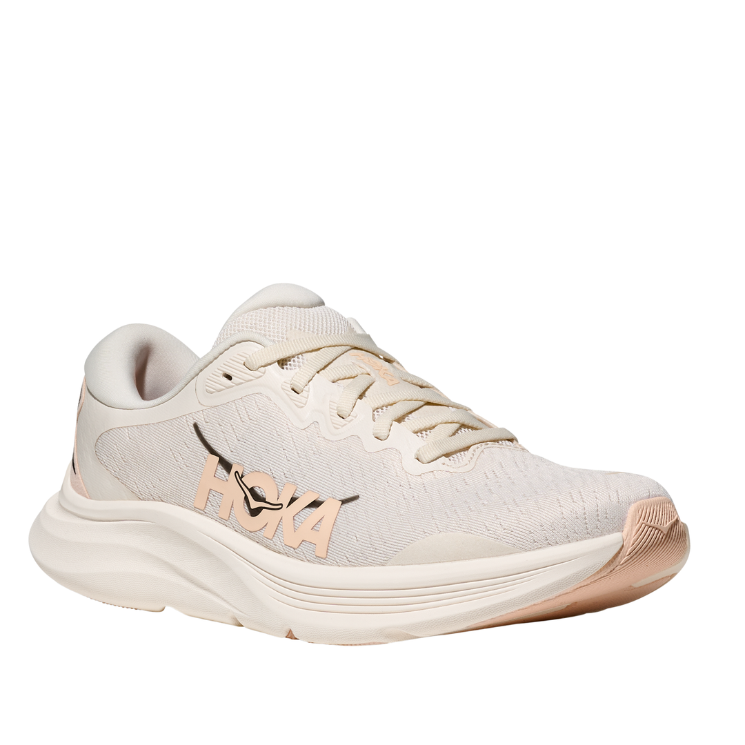 White running shoe with 'Hoka' branding on a white background
