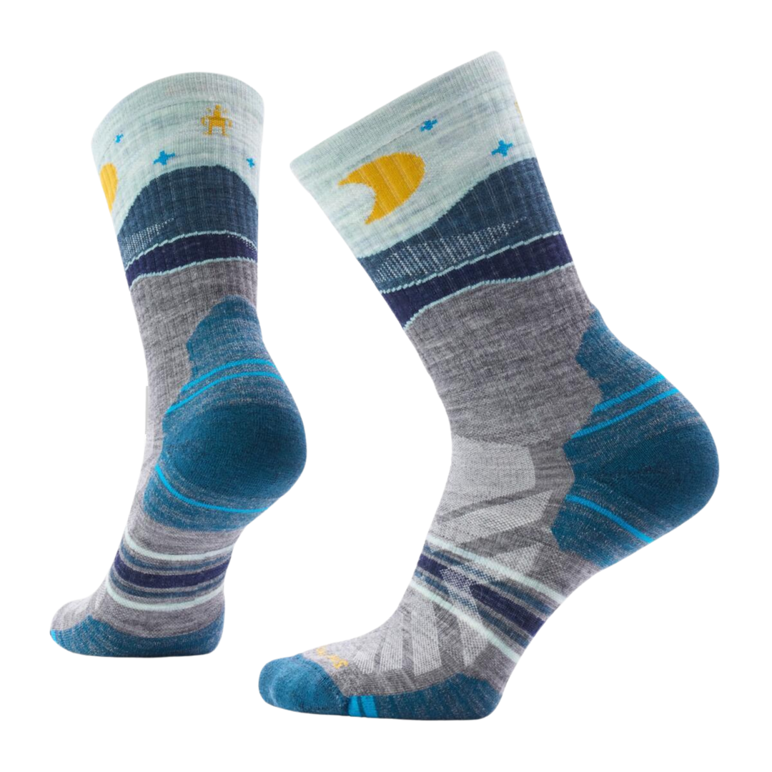 Pair of socks with blue, gray, and yellow pattern on a white background