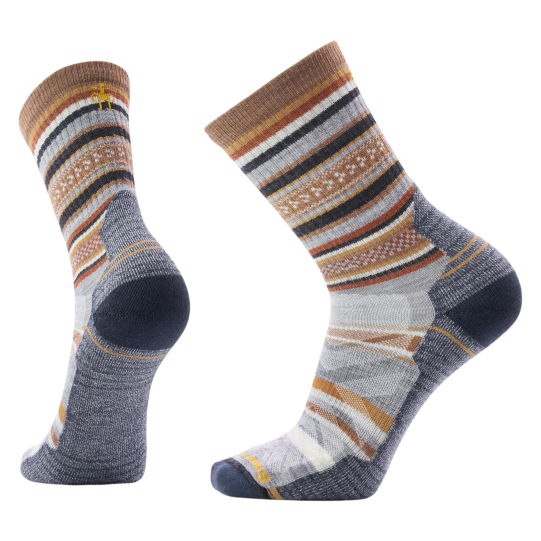 Pair of multi colored socks on a white background