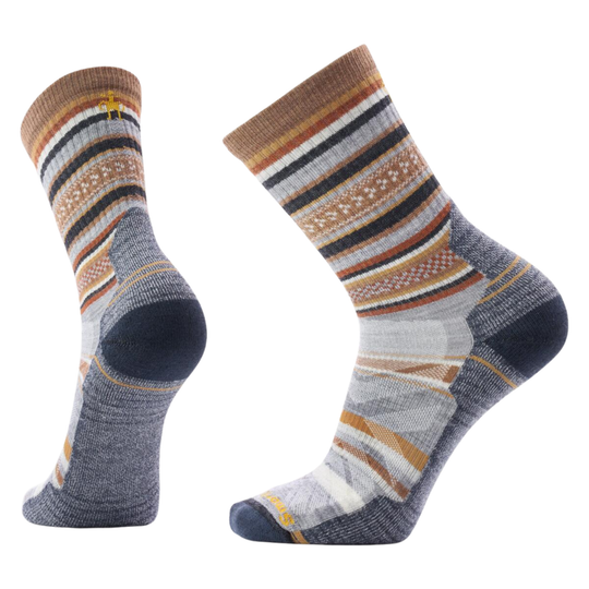 Pair of multi colored socks on a white background