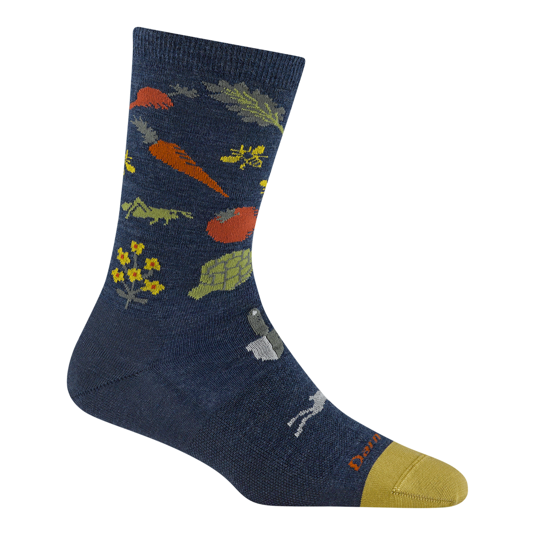 Navy sock with colorful animal and plant pattern on a white background