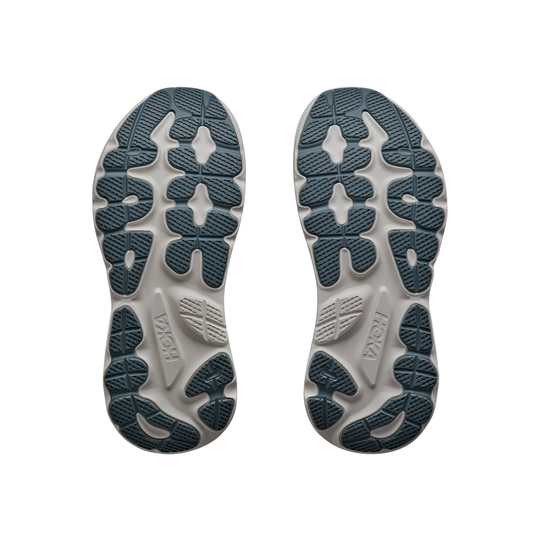 Two shoe soles with a brand logo on a white background