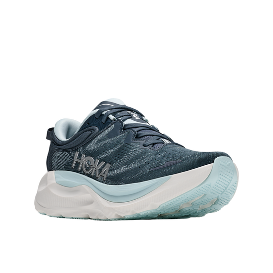 Blue running shoe with white sole on a white background