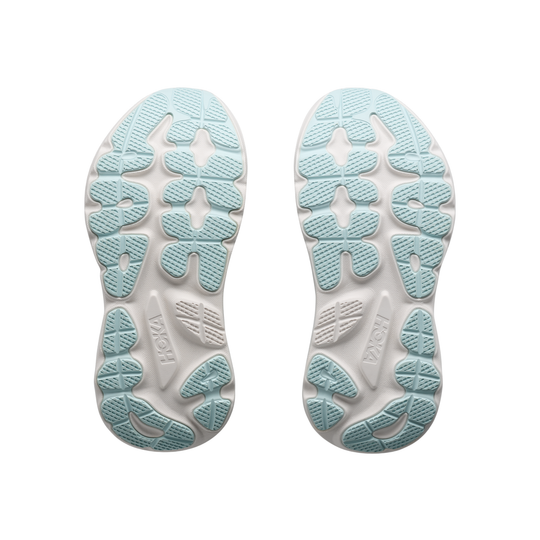 Light blue and white sole of a shoe with brand logo on a white background