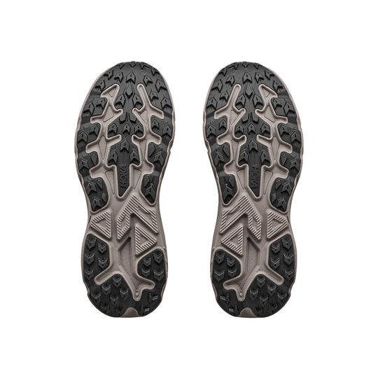 Top view of a pair of black and gray running shoes with tread pattern on a white background