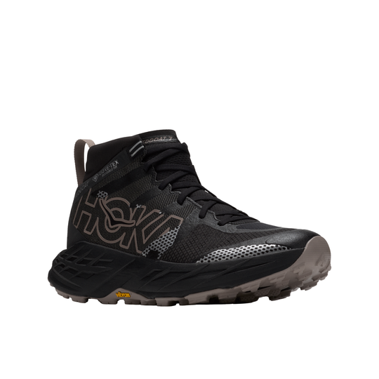Black hiking boot with visible brand logo on a white background