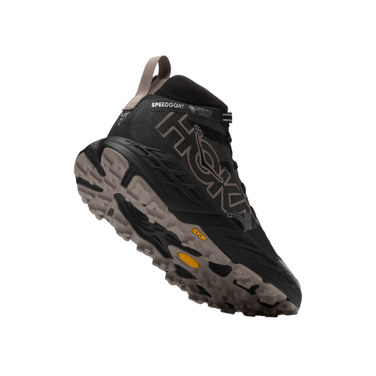 Black and gray hiking shoe with brand logo on a white background