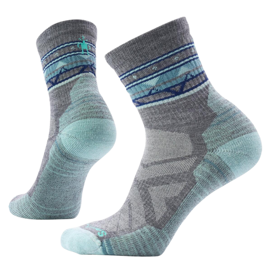 Pair of gray and blue patterned socks on a white background