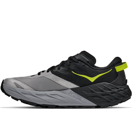 Gray and black running shoe with a yellow accent on a white background
