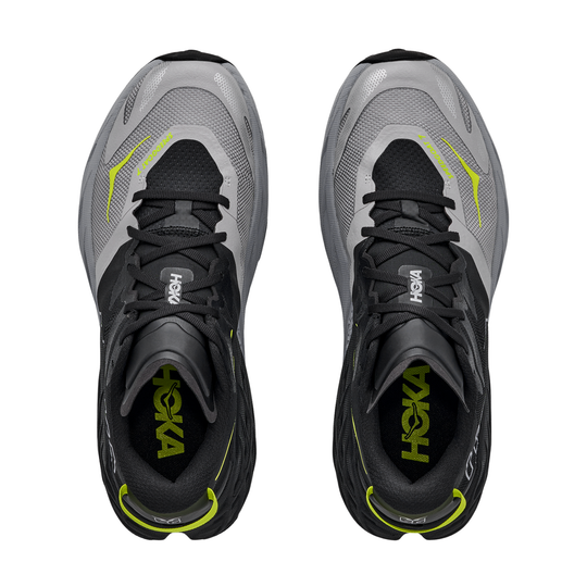 Pair of Hoka running shoes on a white background
