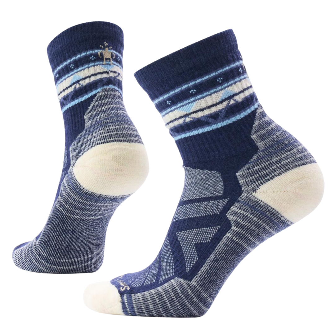 Pair of blue and white patterned socks on a white background