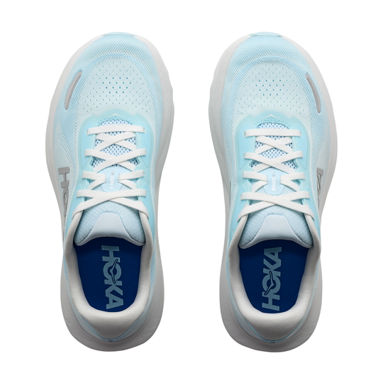 Light blue running shoes with white laces on a white background