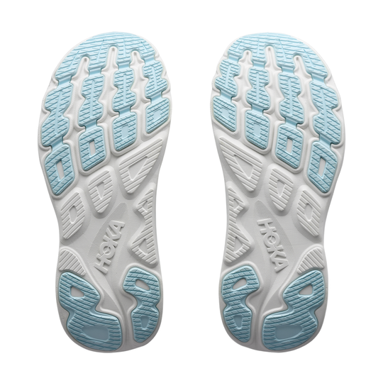 Close-up of the sole of a shoe with blue and white pattern on a white background