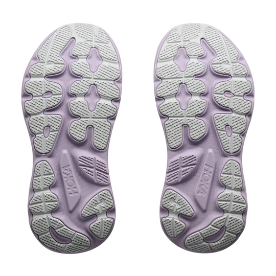 Purple and white sole of a shoe with brand logo on a white background