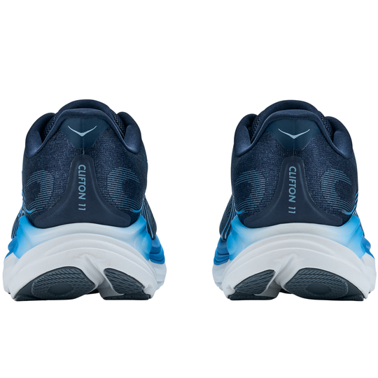 Navy and blue running shoes with 'Clifton 11' text on a white background