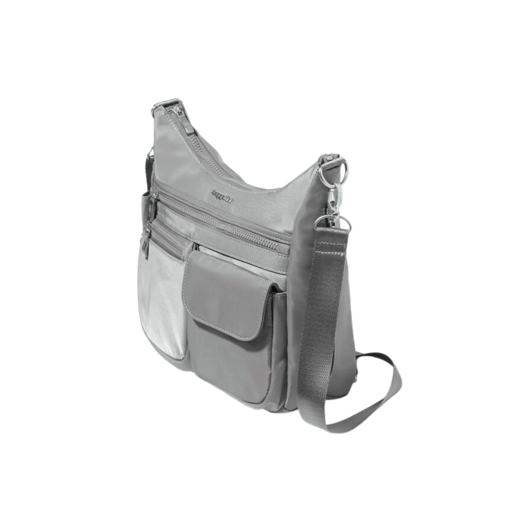 Gray shoulder bag with multiple zippers on a white background