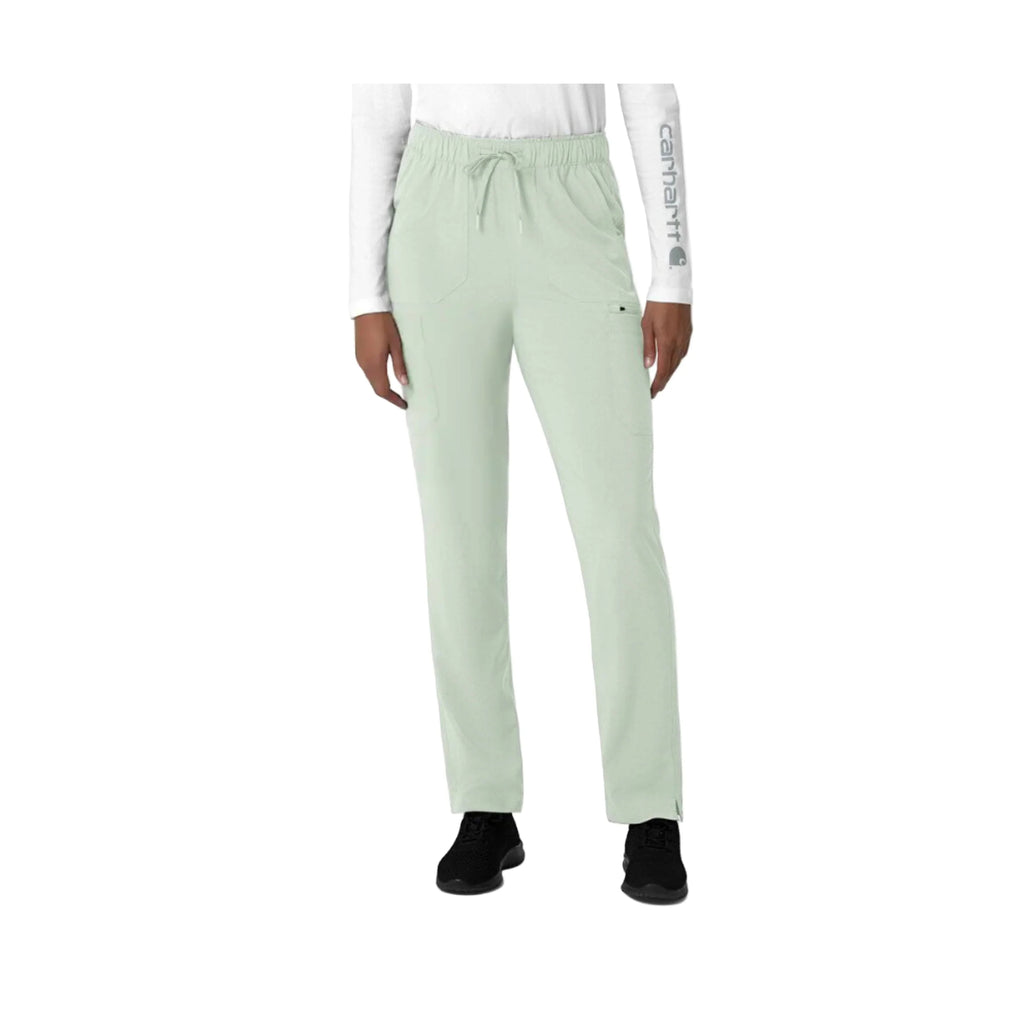 Light green pants worn by a person on a white background