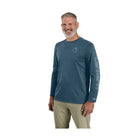 Man wearing a blue long-sleeve shirt with a logo on a white background