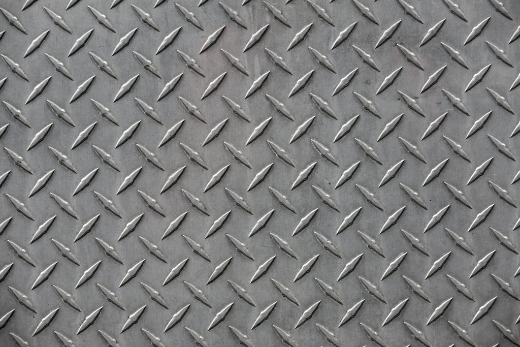 Diamond plate pattern on a textured surface