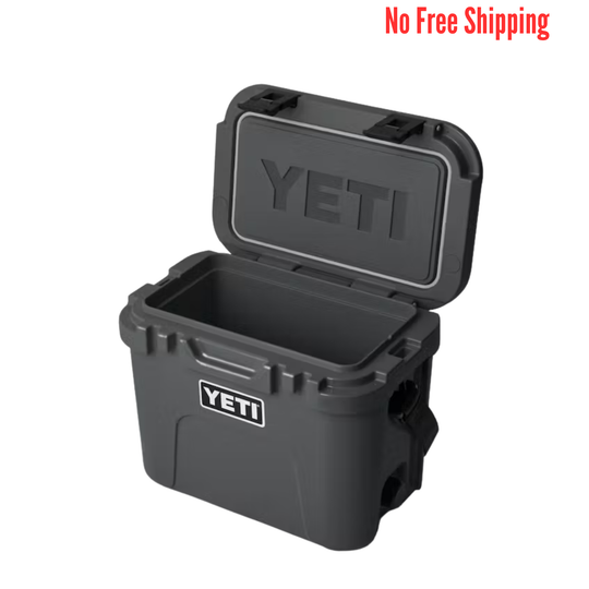 Black YETI cooler with open lid on a white background