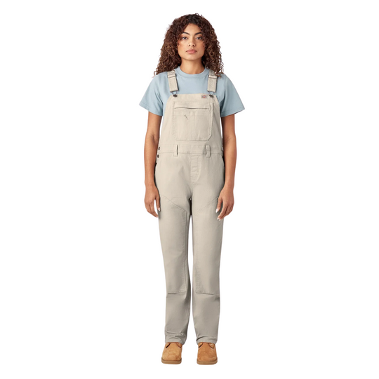 Dickies Women's Double Front Bib Overalls - Rinsed Stone on a female model on a white background