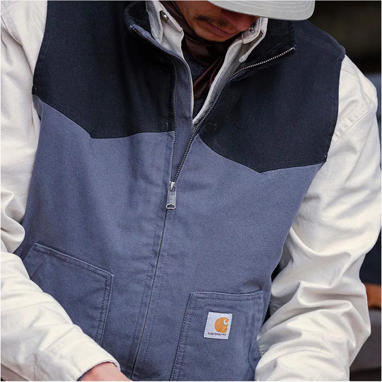 Carhartt Men's Montana Rugged Flex Duck Vest - Shadow/Black on a male model on a white background.