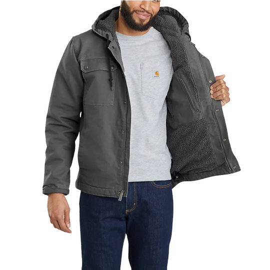 Carhartt Men's Washed Bartlett Jacket - Grey on a male model on a white background. Showing the interior fleece lining.