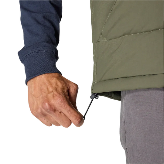 Carhartt Men's Montana Loose Fit Insulated Vest - Moss on a male model on a white background. Zoomed in on bungee tightening the waist. 