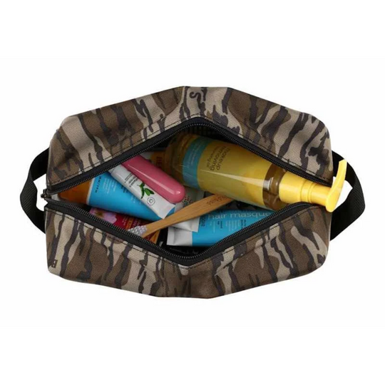 Carhartt Travel Kit - Bottomland on a white background. Zipper open with items in bag.