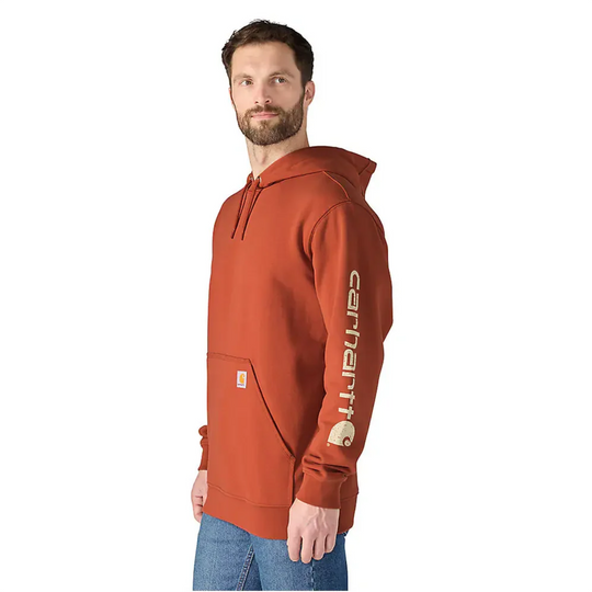 Carhartt Men's Midweight Hooded Logo Sweatshirt - Homestead Red on a male model on a white background.
