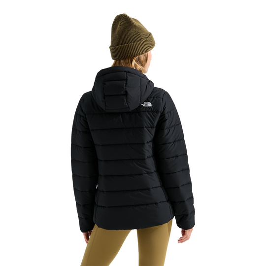 The North Face Women’s Aconcagua Hooded Jacket - TNF Black on a female model on a white background.