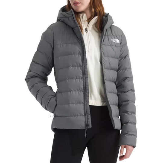 The North Face Women’s Aconcagua Hooded Jacket - Smoked Pearl on a female model on a white background.