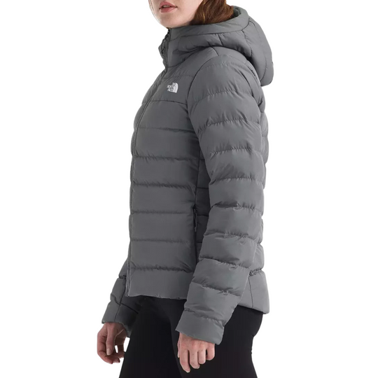 The North Face Women’s Aconcagua Hooded Jacket - Smoked Pearl on a female model on a white background.