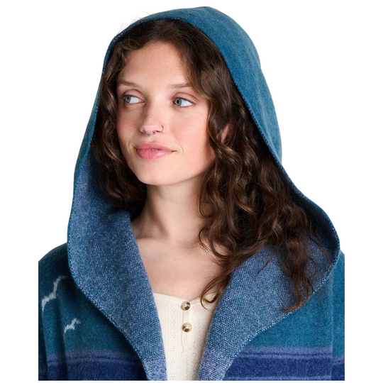 Toad & Co Women's Merino Heartfelt Hoodie - Twilight Pattern on a female model on a white background. Zoomed in on hoodie pulled over.