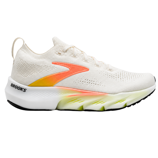 A white and peach colored sneaker on a white background