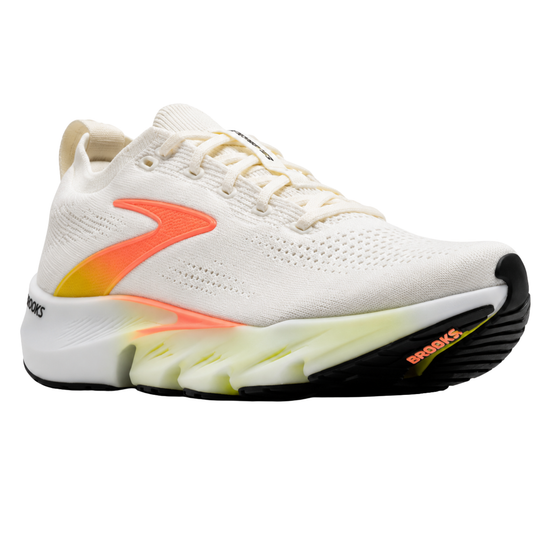 A white and peach colored sneaker on a white background