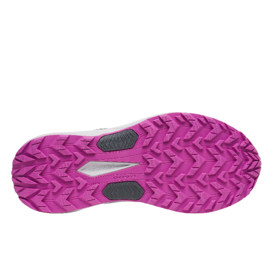 Close-up of a purple athletic shoe sole with tread pattern on a white background