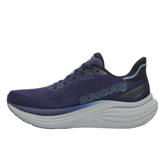Navy running shoe with white sole on a white background