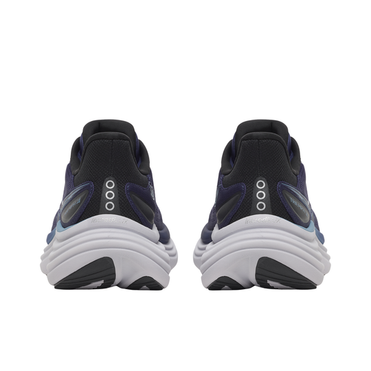 Blue and white athletic shoes with visible branding on a white background