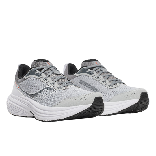 Pair of gray running shoes with black soles on a white background